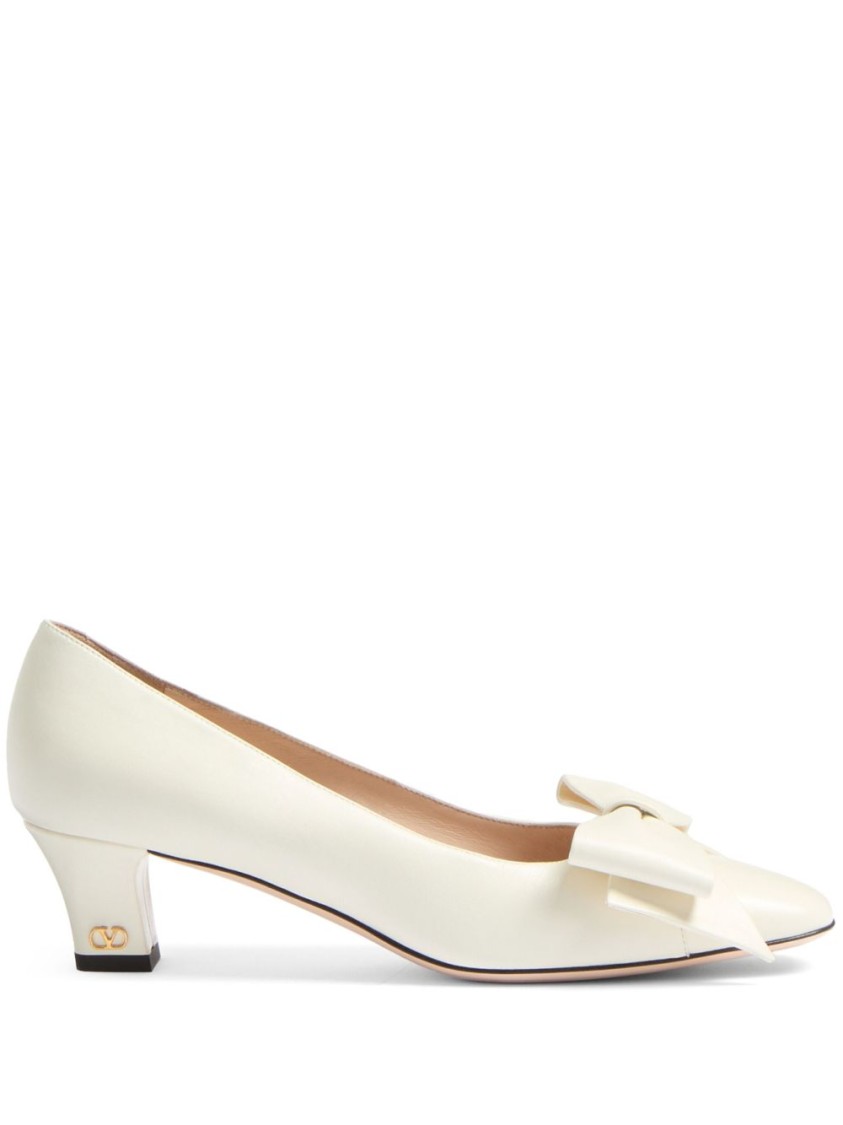 Shop Valentino Garavani Bow Detail White Leather Pumps With Signature V Logo