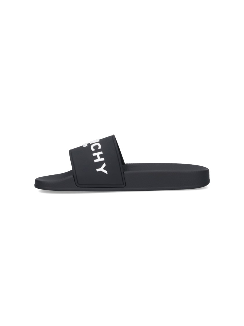 Givenchy Black Logo Embossed Slides In Black