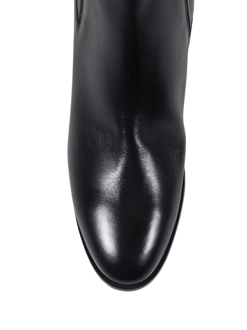 Sergio Levantesi Ankle Boots With Pointed Toe And Ribbed Side Panels In Black