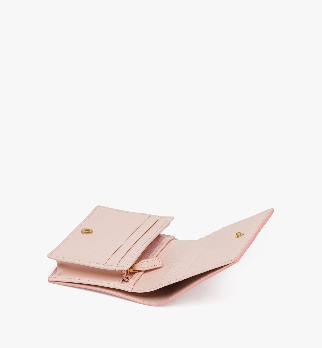 Mcm Embossed Leather Wallet In Pink