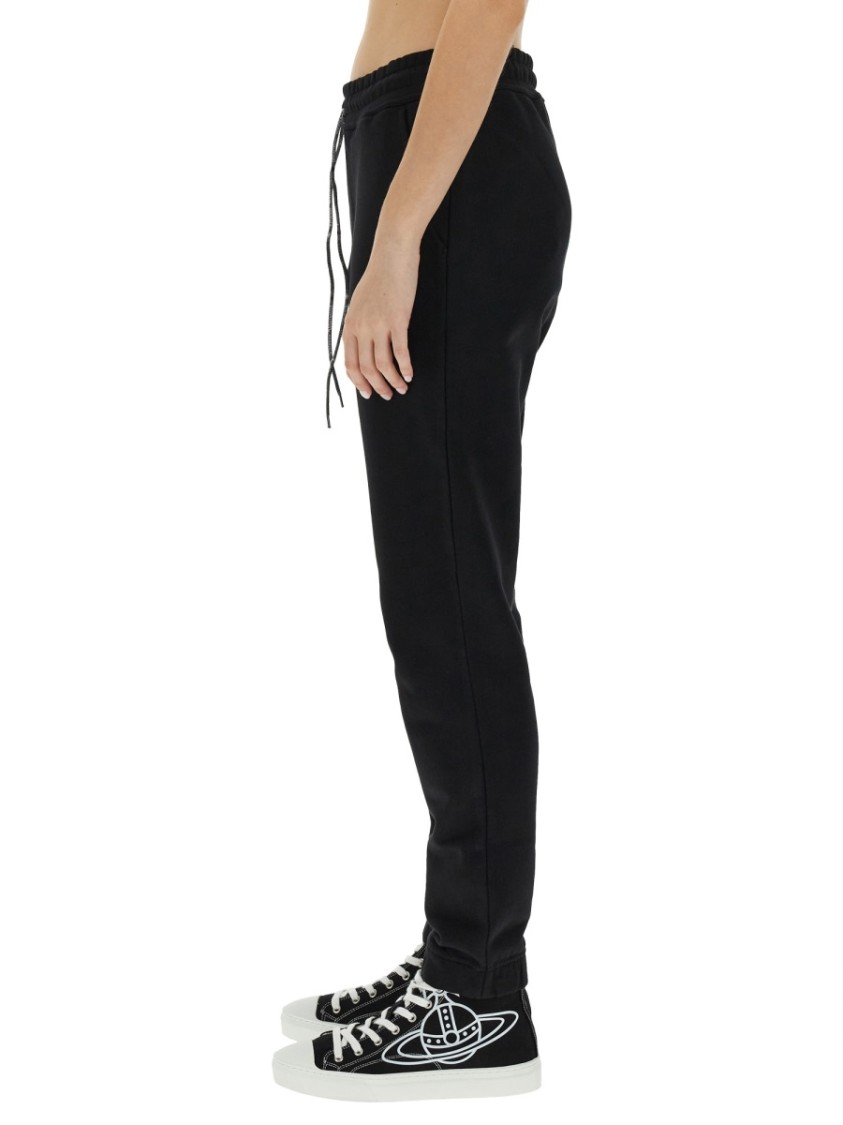 Vivienne Westwood Women Jogging Pants With Spray Print Orb In Black