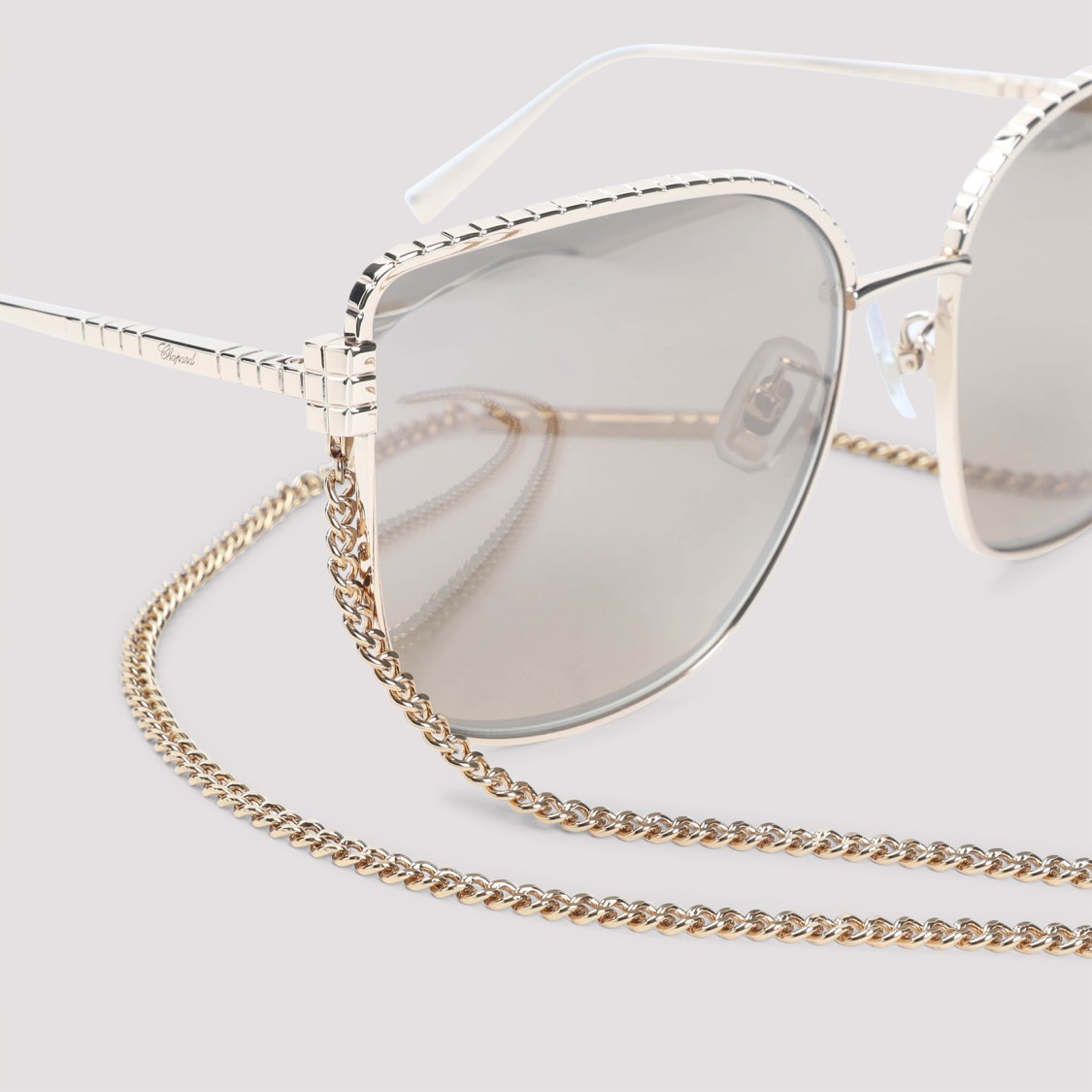 Chopard Chic Metallic Frame Sunglasses With Delicate Chain In Gray