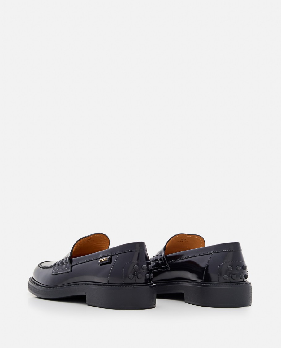 Tod's Mustard Gomma 20l Moccasins With Grommet-accented Heel In Black