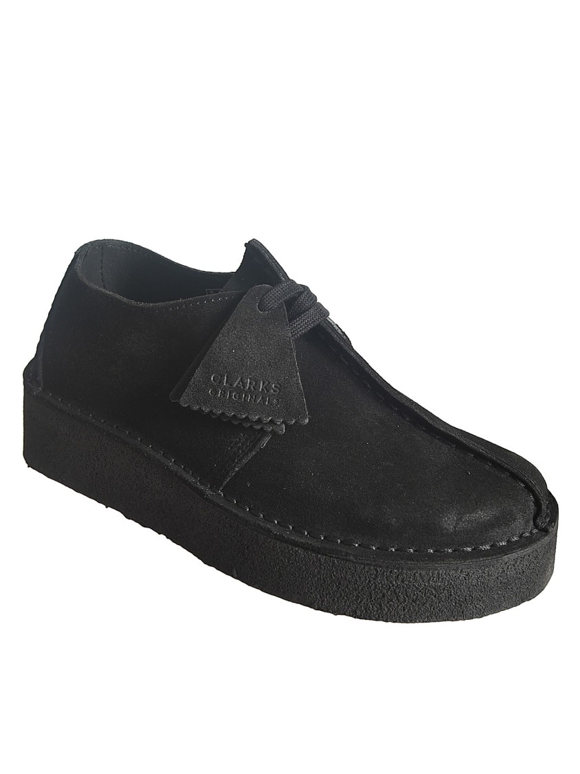 Clarks Minimalist Leather Wedge Shoes With Decorative Tassel In Black