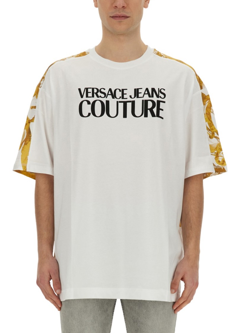 Shop Versace Jeans Couture Oversized T-shirt With Bold Logo And Intricate Patterned Sleeves In White