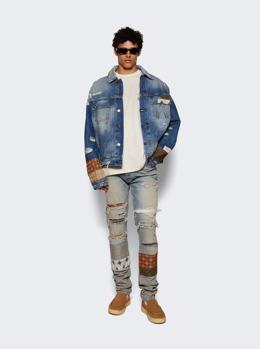 Amiri Distressed Stretch Denim Jeans With Faded Effect In Blue