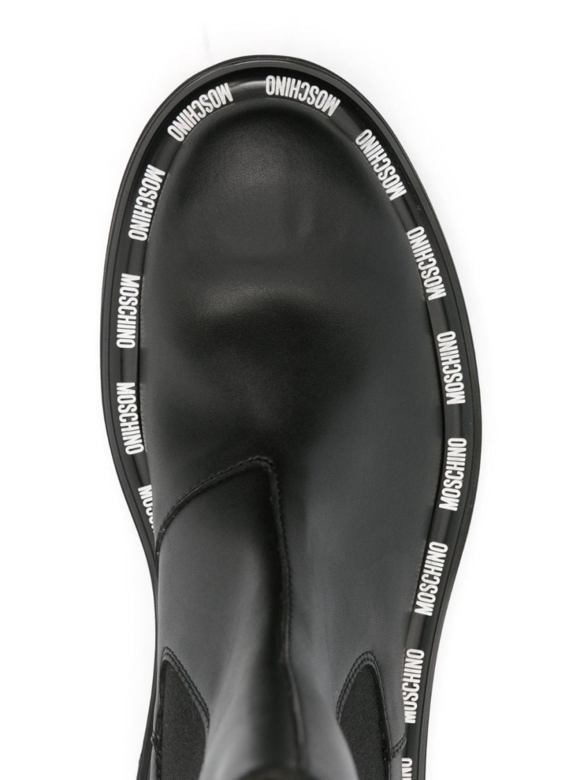 Moschino Rounded Toe Ankle Boots In Black