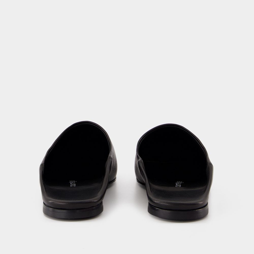 Shop Courrèges Heritage Shadow Mules - Leather - Black