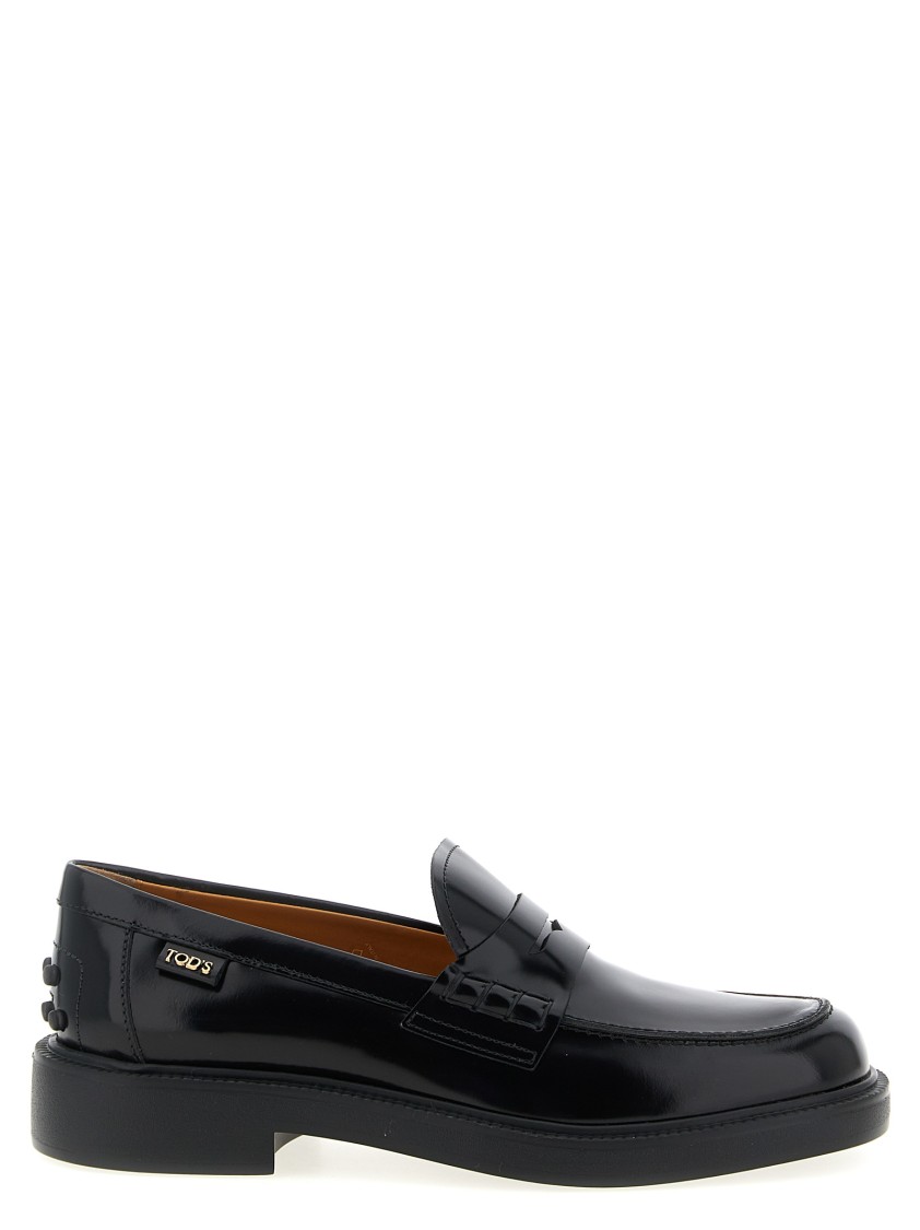 Tod's Mustard Gomma 20l Moccasins With Grommet-accented Heel In Black