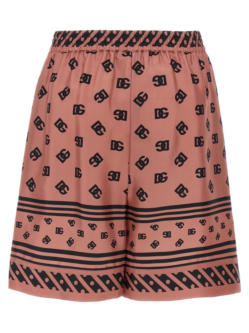Dolce & Gabbana Pink Bermuda Shorts With Dg Logo Printed All-over In Neutral
