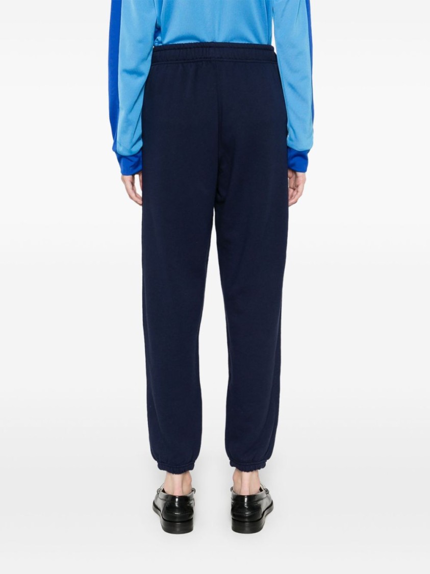 Shop Polo Ralph Lauren Relaxed-fit Blue Trousers With Tapered Cuffs