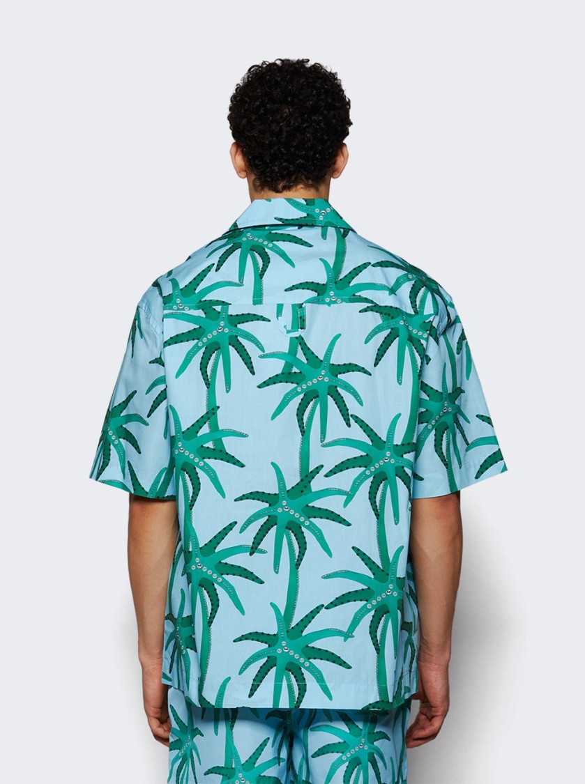 Jacquemus 'la Chemise Jean' Light Blue Shirt With Notched Collar And All-over Palm Tree Print