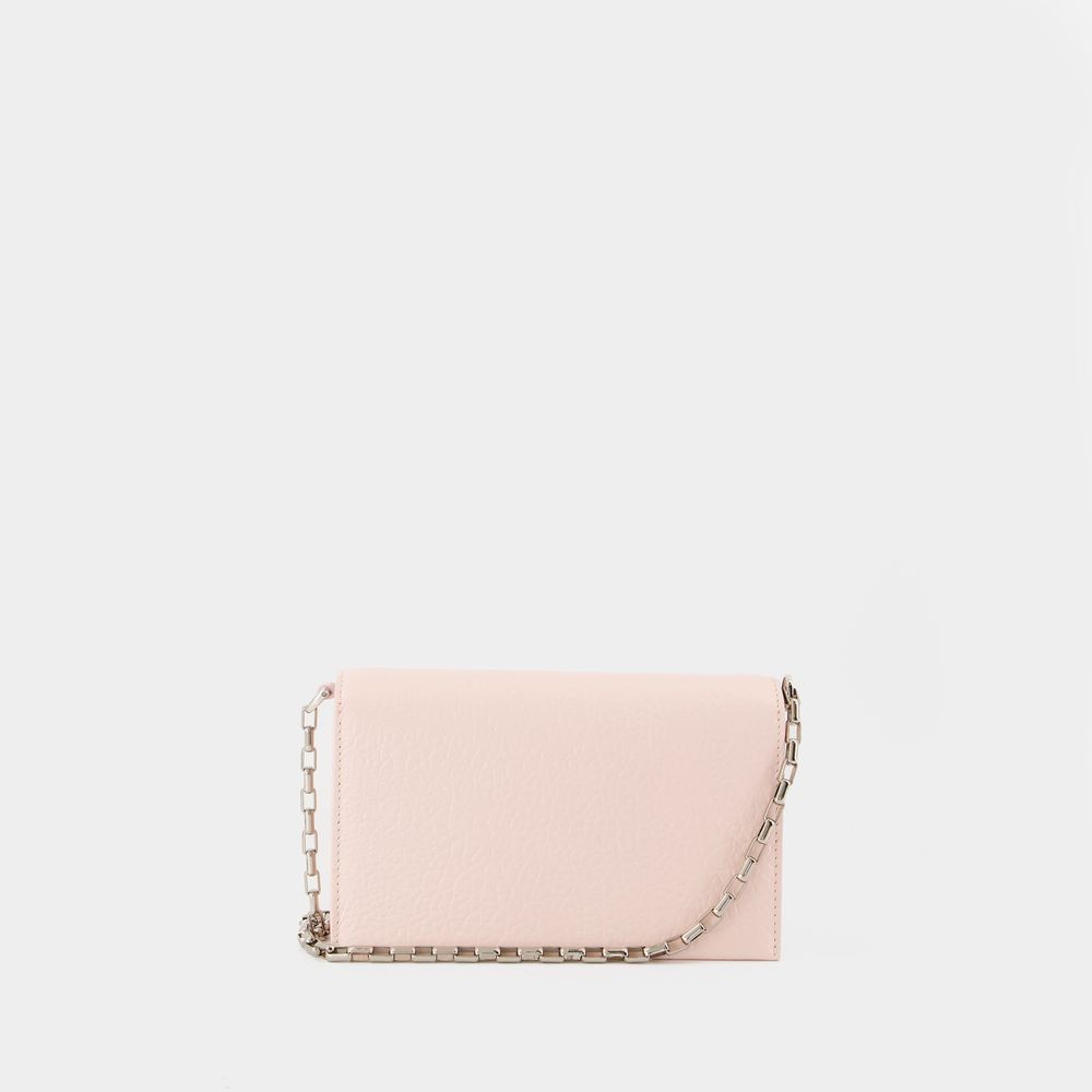 Alexander Mcqueen Mini Cross Bar Purse In Pink
