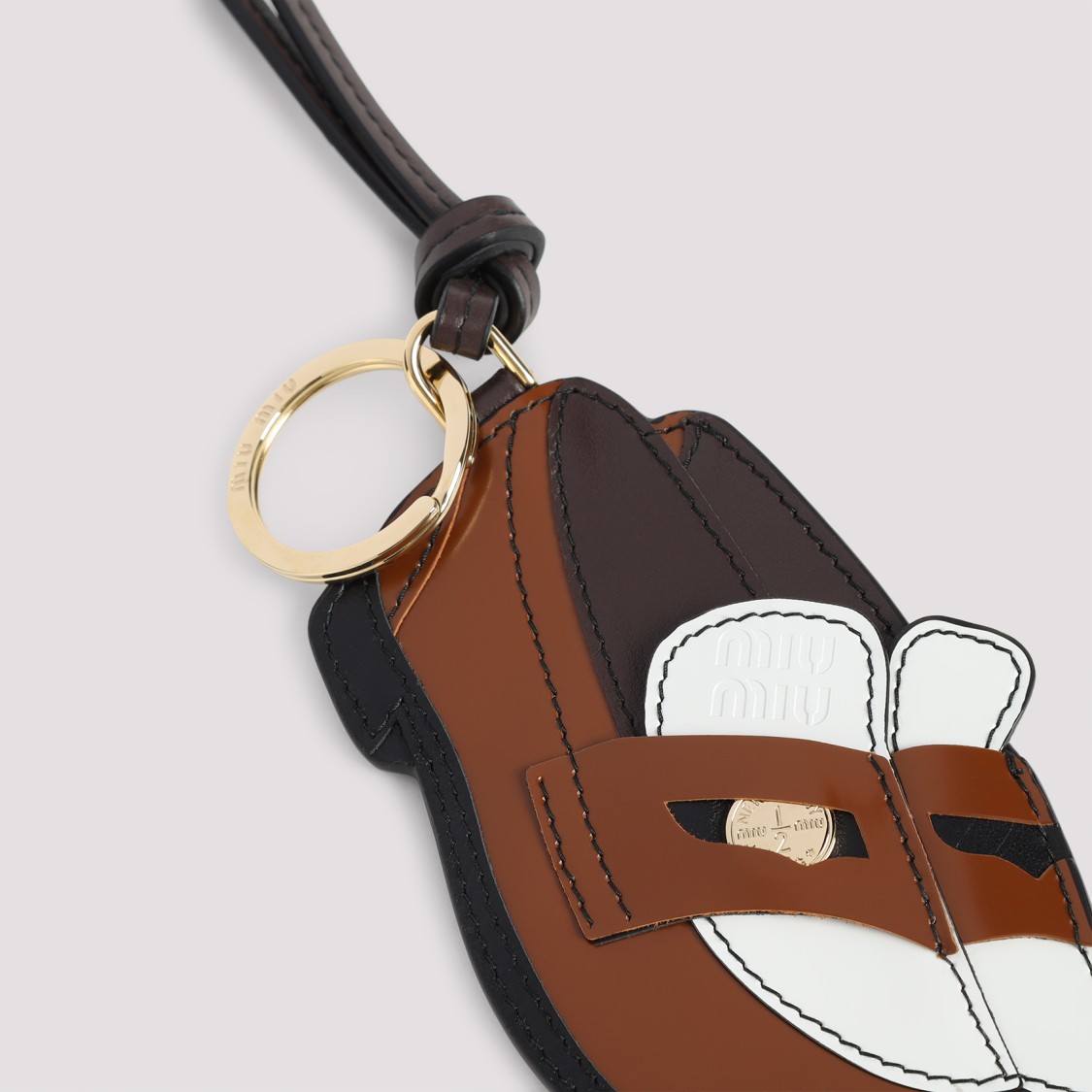 Miu Miu Playful Calf Leather Clutch With Gold Ring Detail In Brown