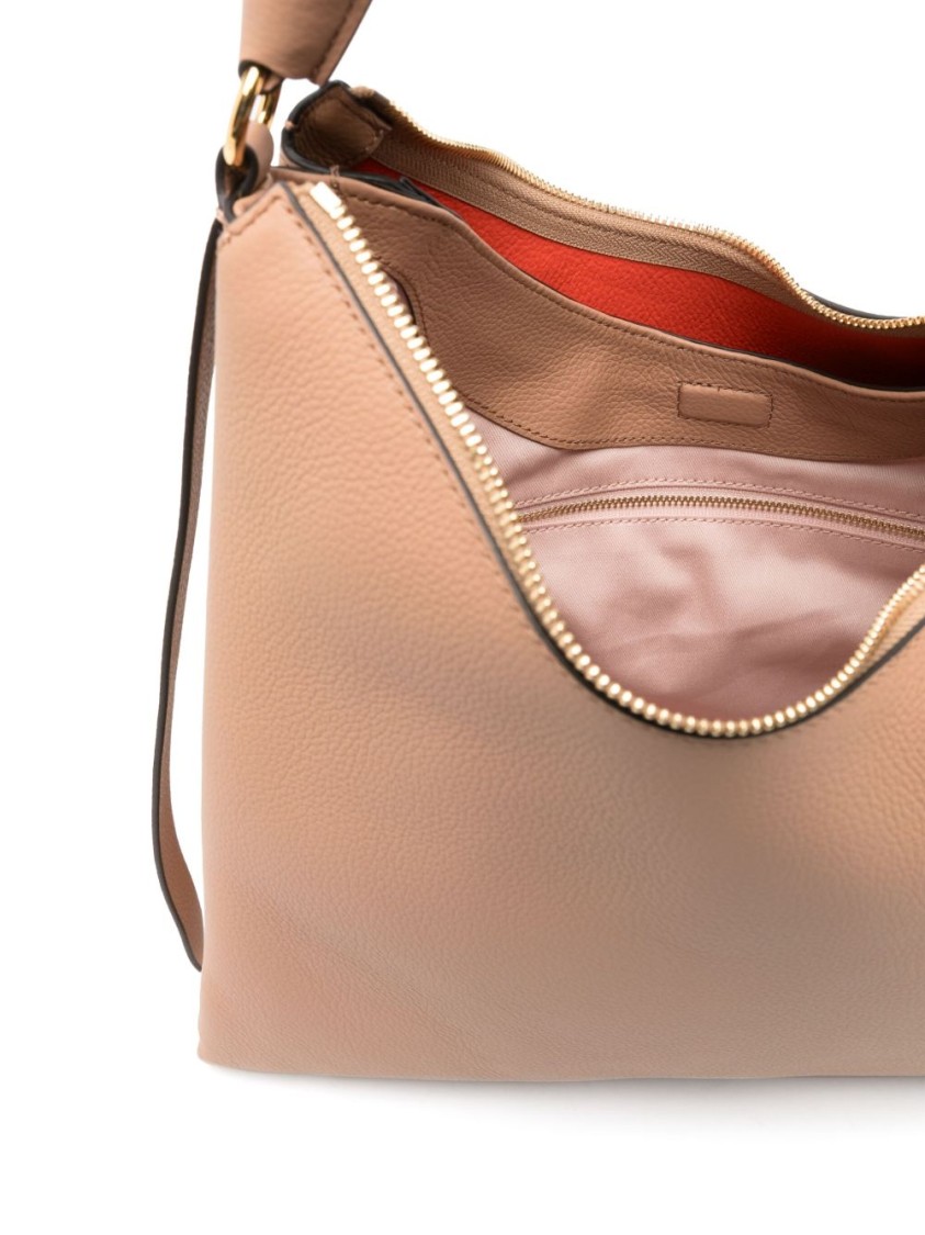 Shop Coccinelle Medium Beige Leather Handbag With Woven Handle
