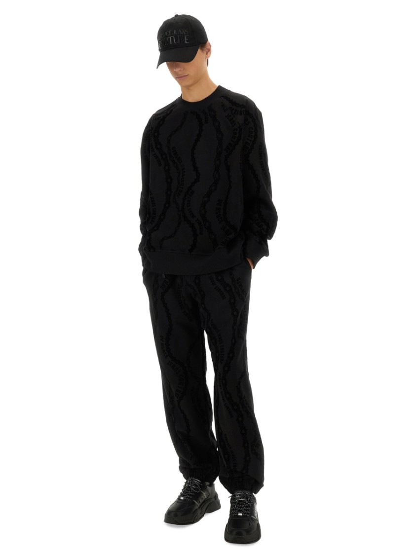 Shop Versace Jeans Couture All Over "chain" Jogging Pants In Black