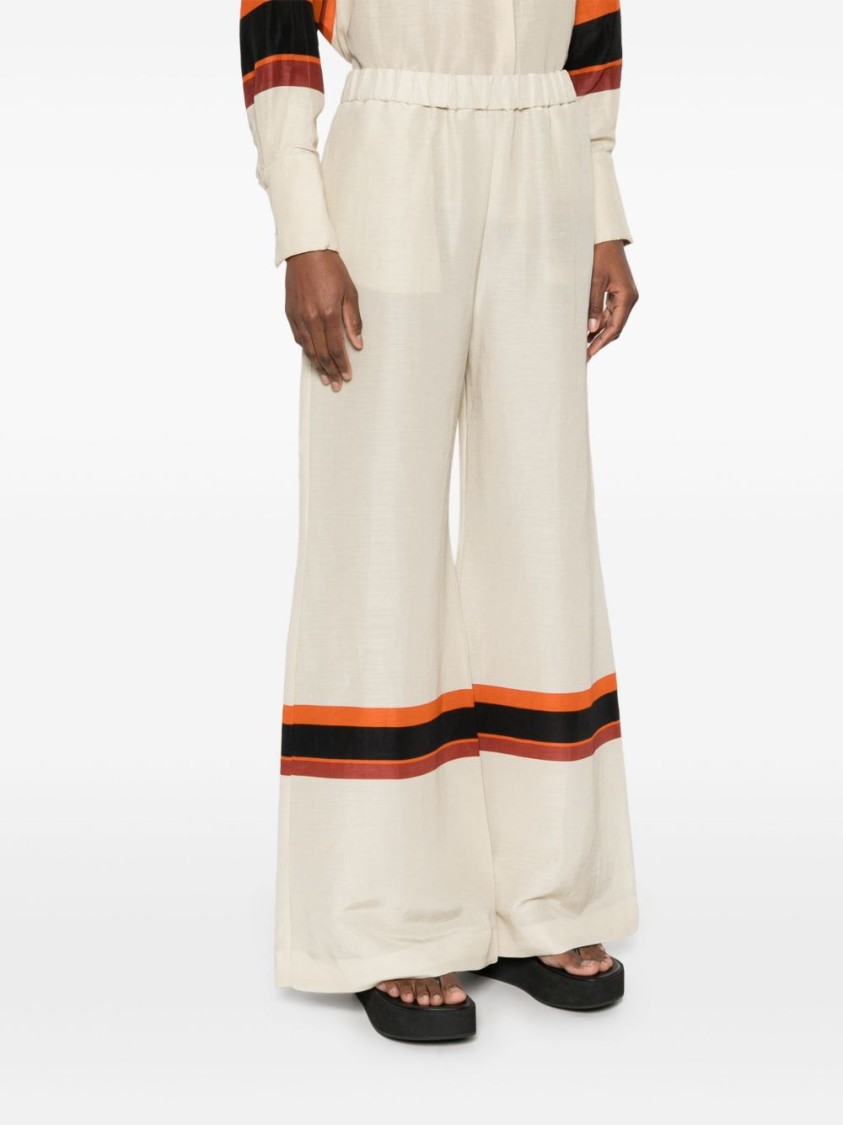 Shop Raquel Diniz Wide-leg Ivory Pants With Bold Stripes