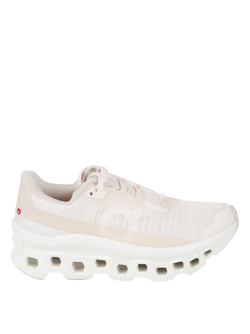 On Running Streamlined Ivory Sneakers With Cushioned Sole In Neutral