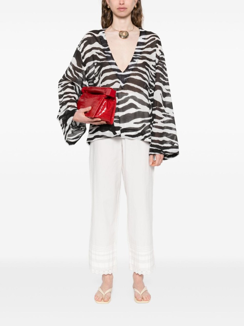 Shop Attico The Zebra Print Top With Deep V-neckline