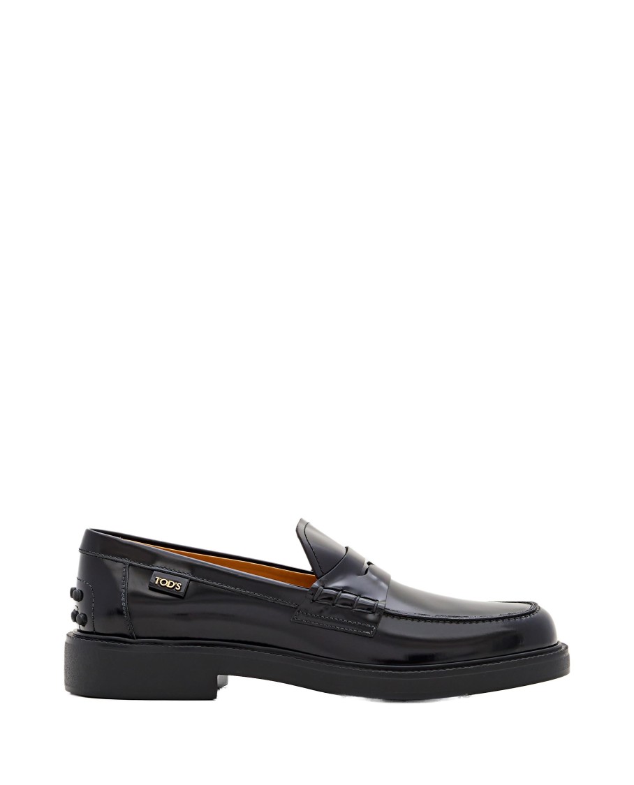 Tod's Mustard Gomma 20l Moccasins With Grommet-accented Heel In Black