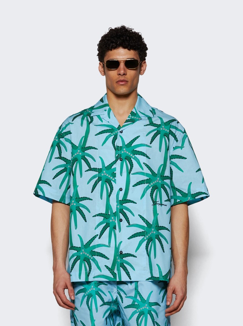 Jacquemus 'la Chemise Jean' Light Blue Shirt With Notched Collar And All-over Palm Tree Print