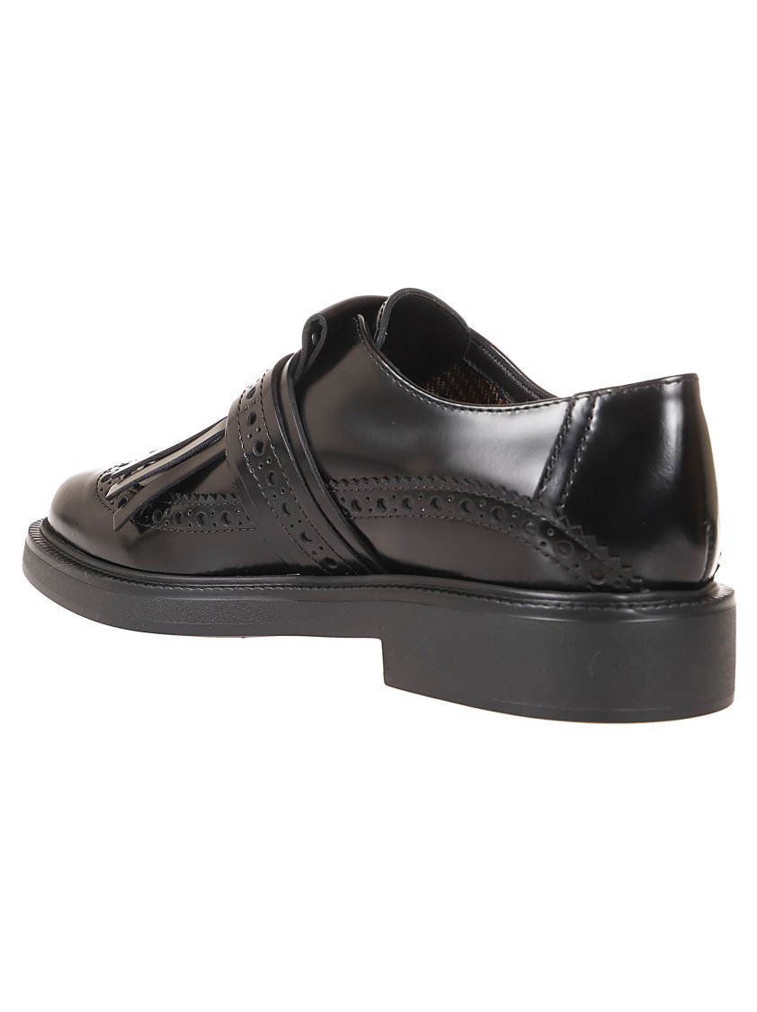 Tod's Leather Moccasins With Decorative Fringe And Buckle Strap In Black