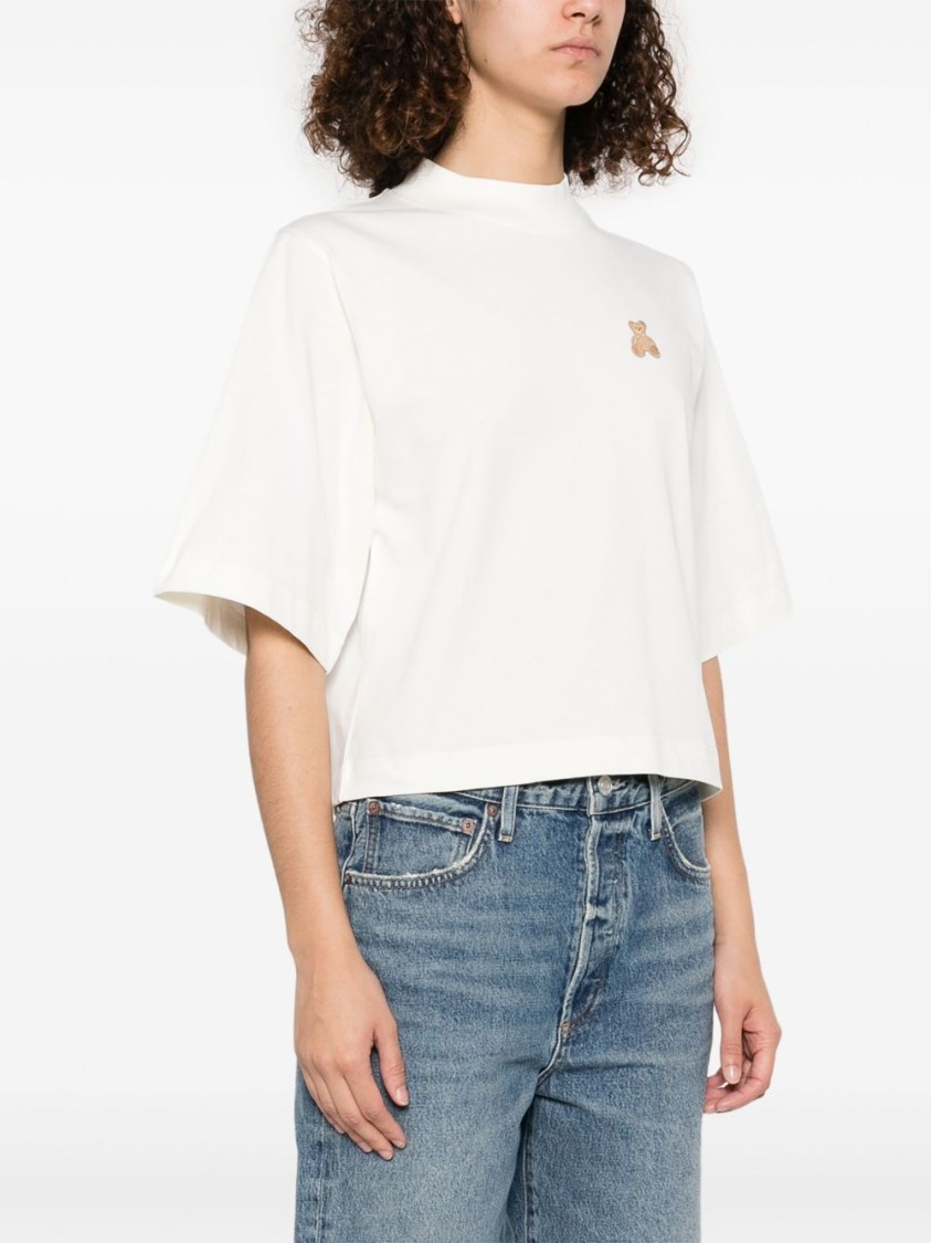 Shop Palm Angels White T-shirt With Cropped Fit And Embroidered Bear Motif