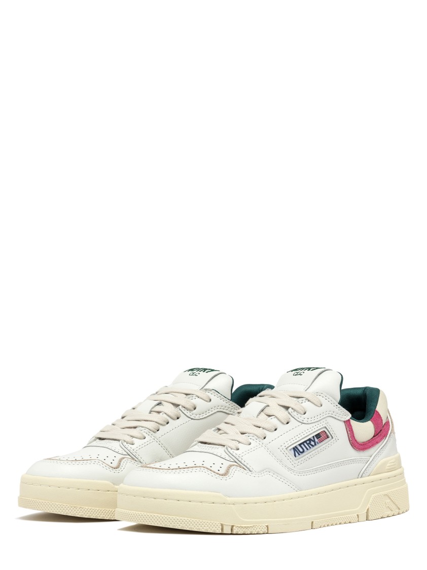 Autry Low-top Leather Sneakers With Fuchsia Suede Inserts In White