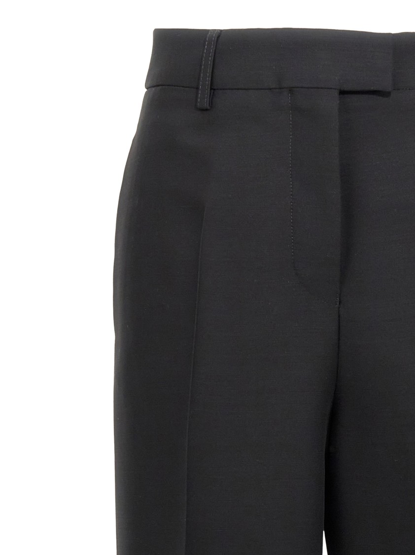 Ferragamo Stretched Pleated Trousers In Black