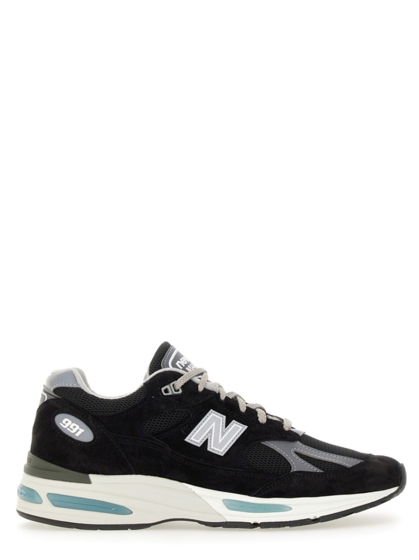 New Balance Mesh And Suede Sneakers With Reflective Accents In Black
