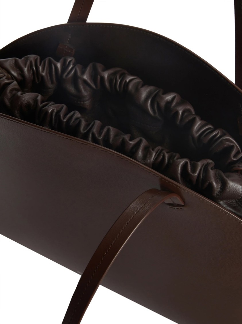Jil Sander 'curve Medium' Brown Shoulder Bag With Embossed Logo On The Front And Curved Design In Brown