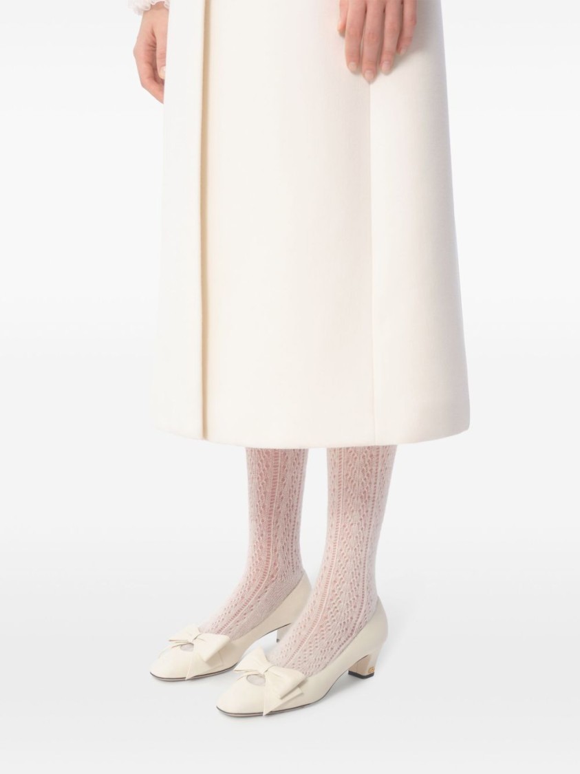 Shop Valentino Garavani Bow Detail White Leather Pumps With Signature V Logo