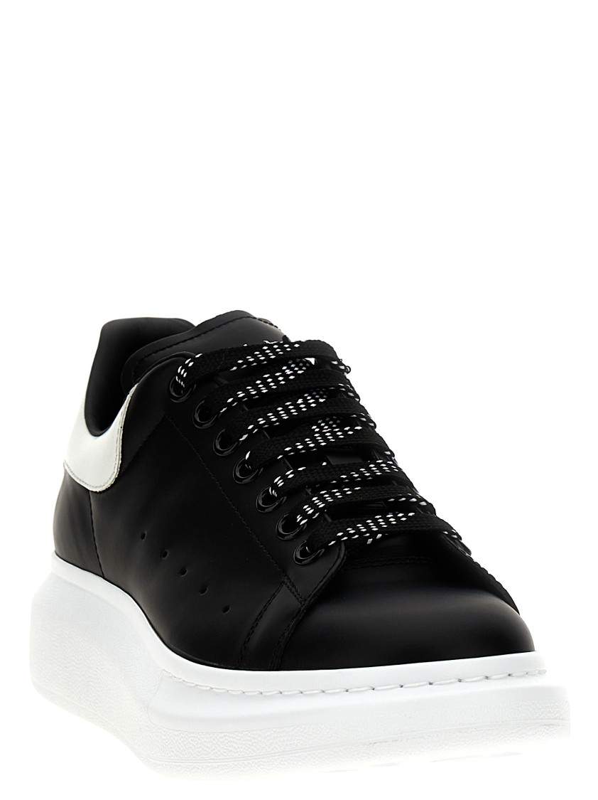 Alexander Mcqueen Black Low Top Sneakers With Chunky Sole And Contrasting Heel In Leather Man In Black