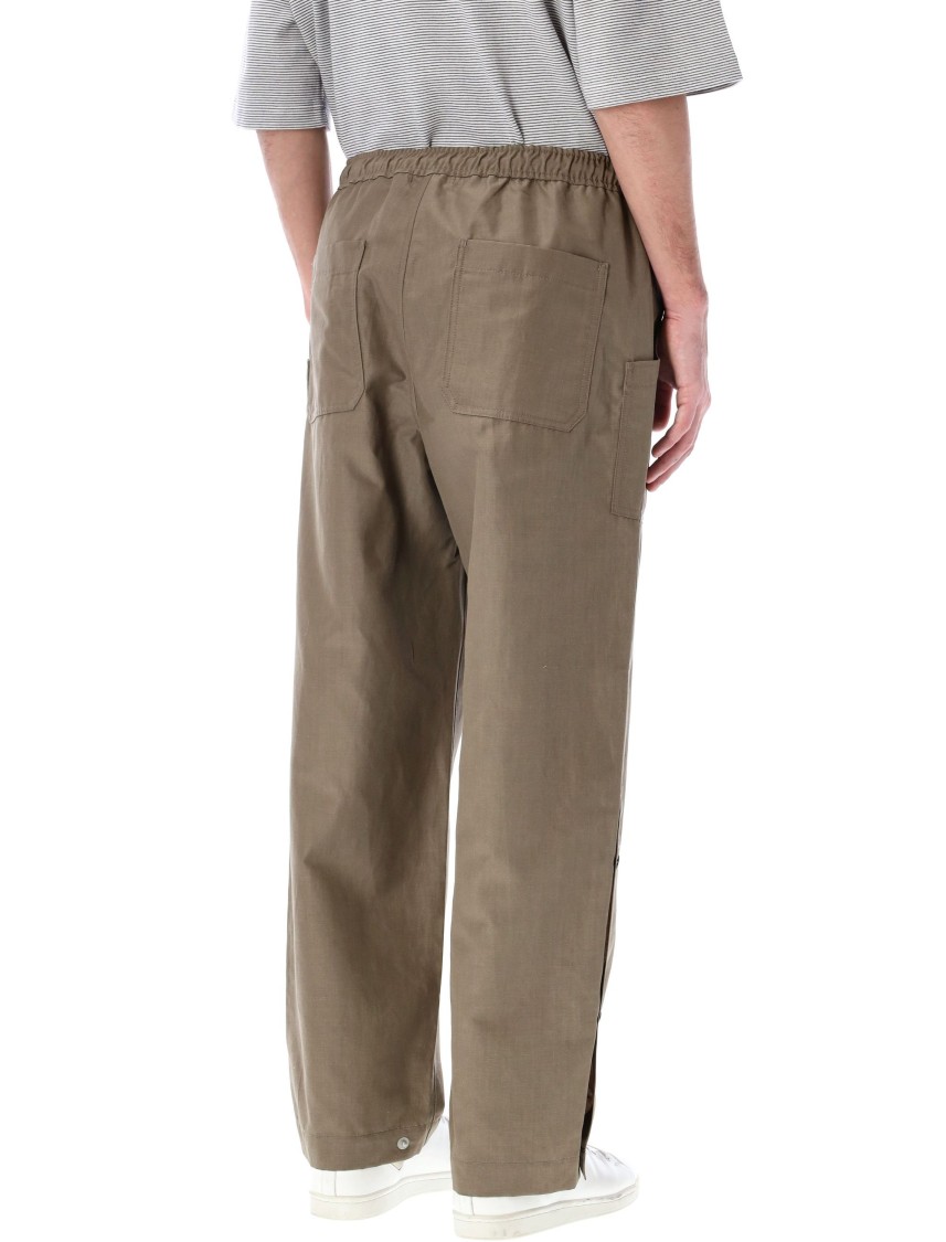 Comme Des Garçons Relaxed-fit Buttoned Pants With Side Detailing In Brown