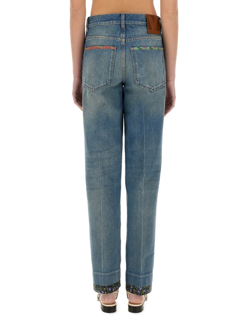 VALENTINO VALENTINO STRAIGHT-FIT DENIM PANTS WITH COLORFUL EMBELLISHMENTS 
