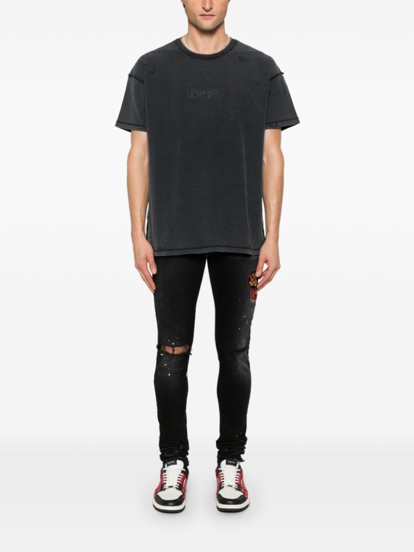 Shop Amiri Slim Fit Black Distressed Jeans With Colorful Patches
