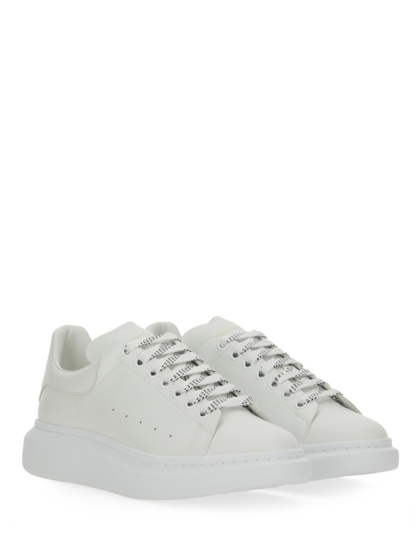 Alexander Mcqueen White Sneakers With Logo Lettering On The Rear And Oversize Rubber Sole In Leather In White