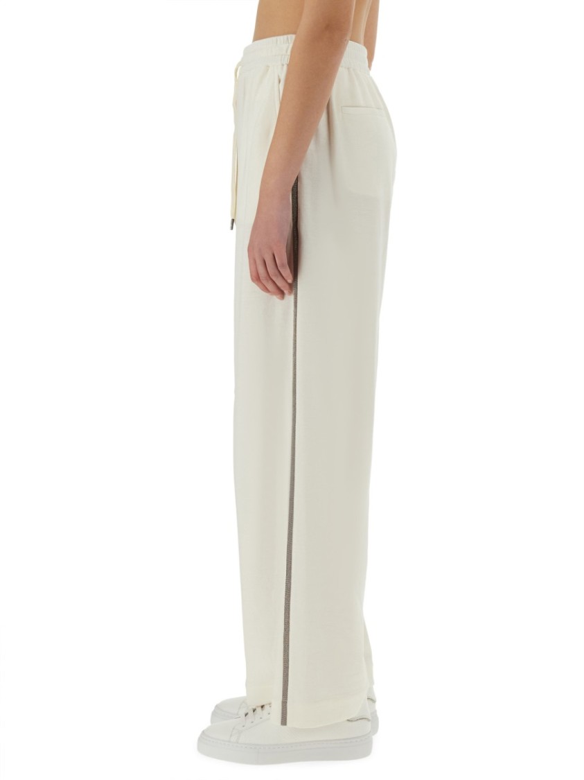 BRUNELLO CUCINELLI BRUNELLO CUCINELLI WIDE-FIT TRACK PANTS WITH ELEGANT SIDE DETAILING