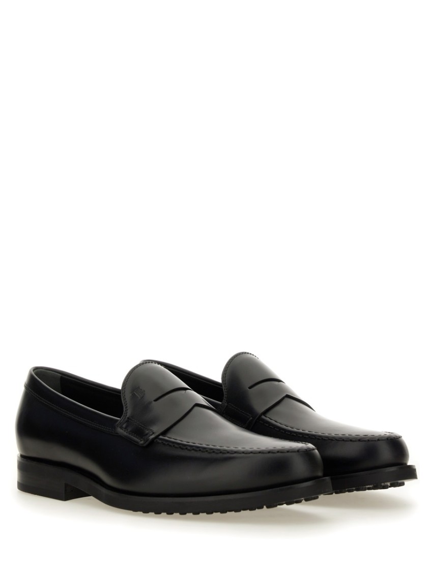 Tod's Smooth Leather Moccasin Loafers With Subtle Stitching In Black