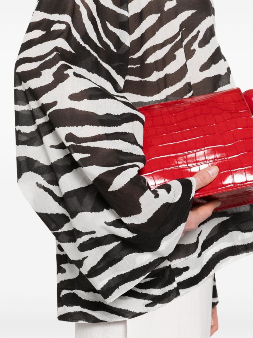 Shop Attico The Zebra Print Top With Deep V-neckline