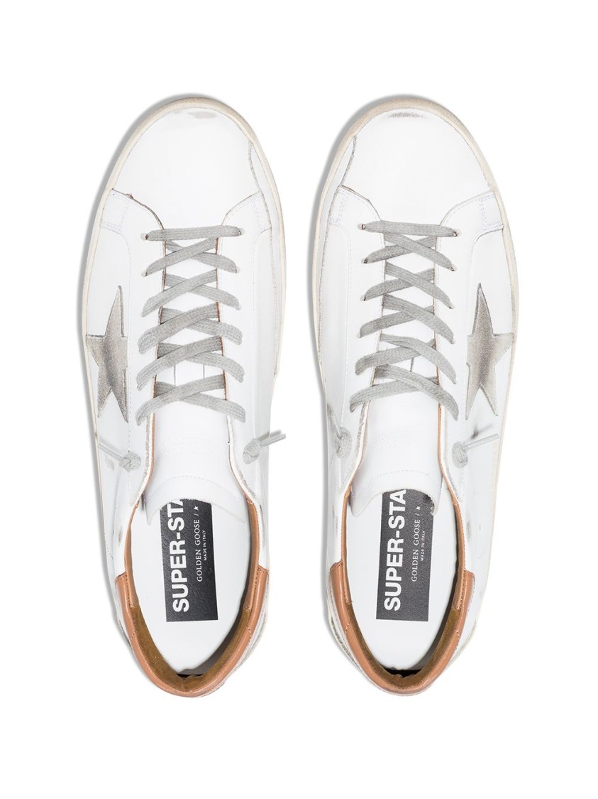 Shop Golden Goose Classic White Low-top Sneakers With Metallic Star And Distressed Finish