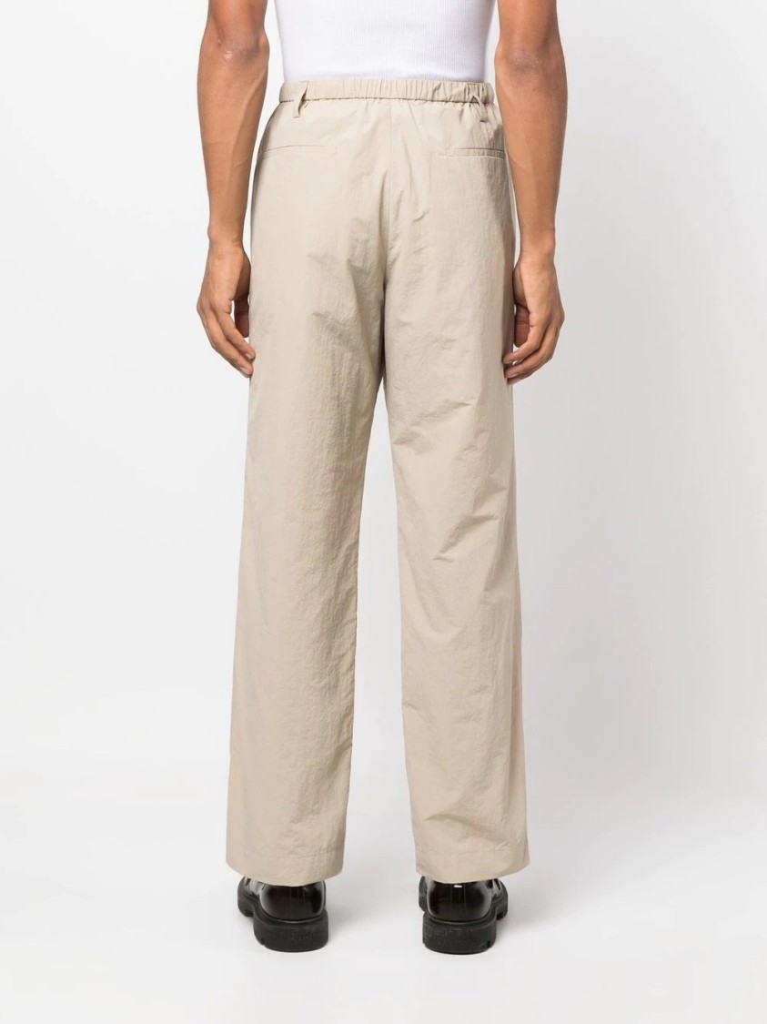 Nanushka Relaxed Fit Trousers With Elastic Waistband And Textured Fabric In Neutral