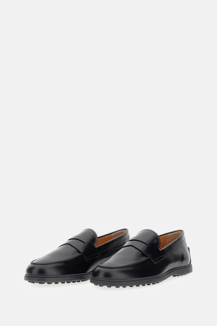 Tod's Calfskin Moccasin With Embossed Monogram And Rubber Gommini Sole In Black