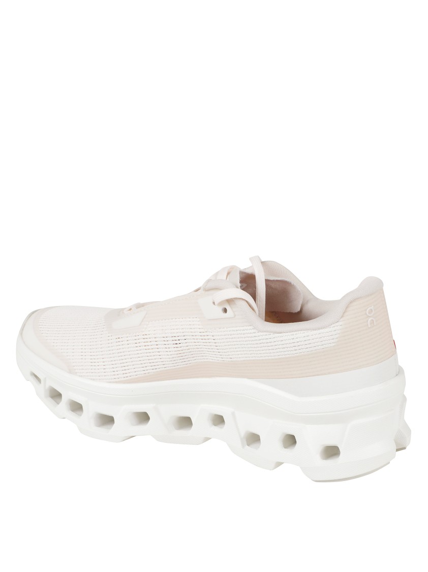 On Running Streamlined Ivory Sneakers With Cushioned Sole In Neutral