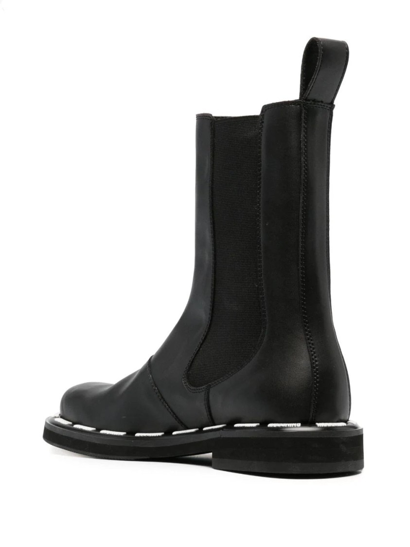 Moschino Rounded Toe Ankle Boots In Black