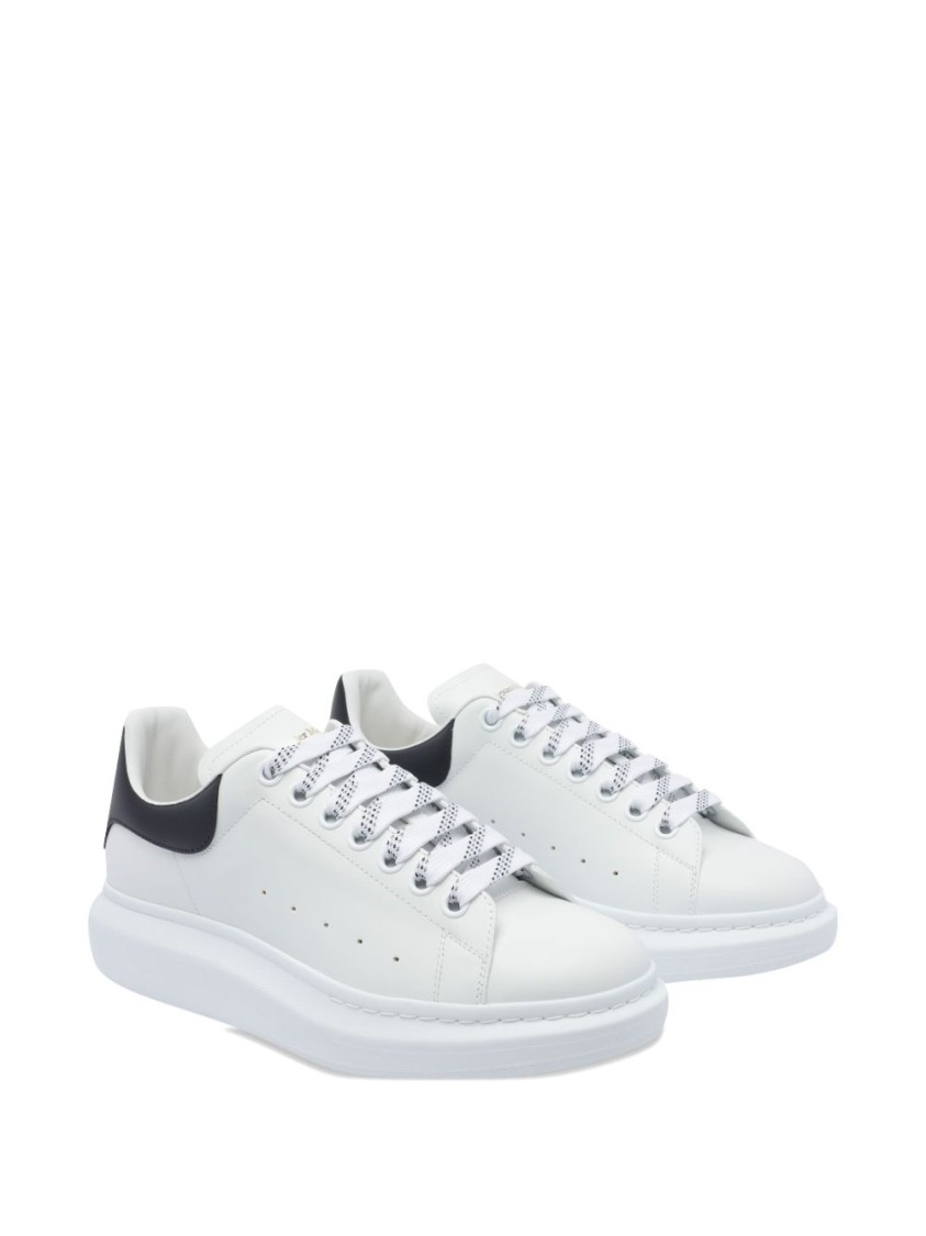Alexander Mcqueen Minimalist White Leather Sneakers With Contrasting Heel Tab In White