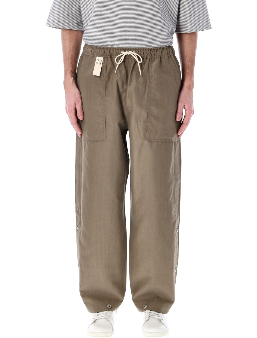 Comme Des Garçons Relaxed-fit Buttoned Pants With Side Detailing In Brown