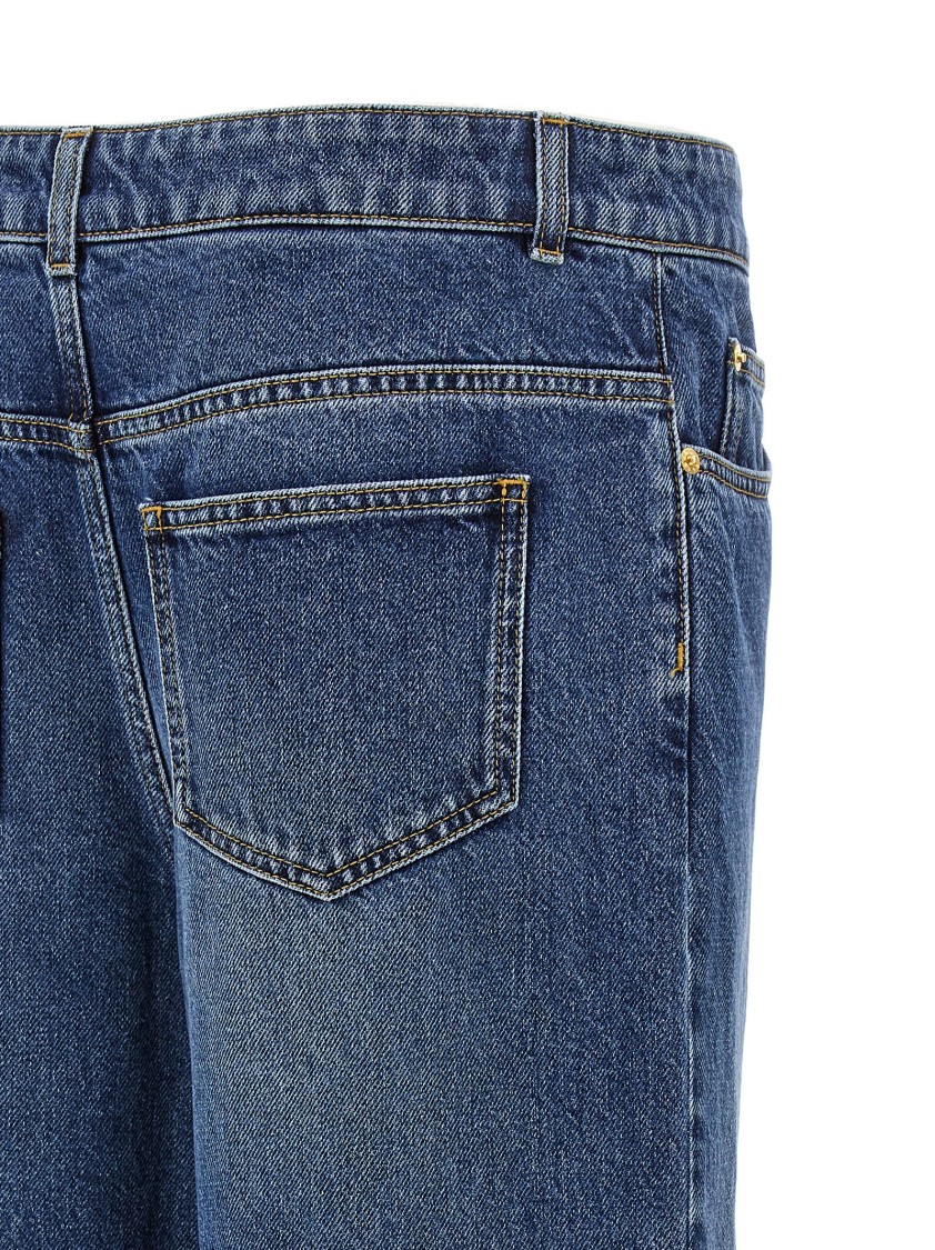 Moschino Wide-leg Denim Jeans With Teddy Button Closure In Blue