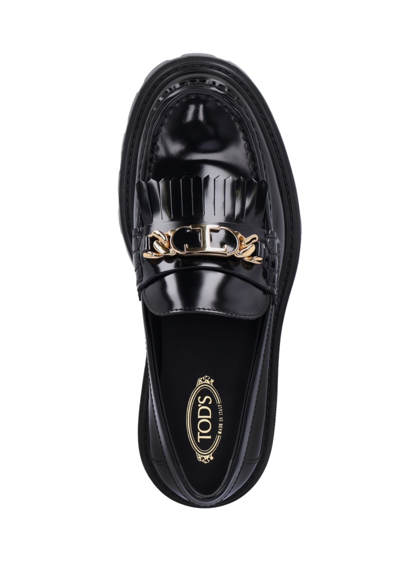 TOD'S TOD'S FRINGED' MOCCASINS – BLACK