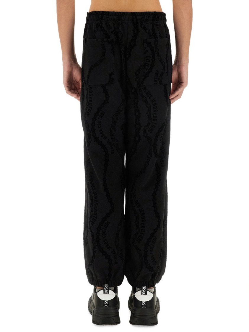 Shop Versace Jeans Couture All Over "chain" Jogging Pants In Black